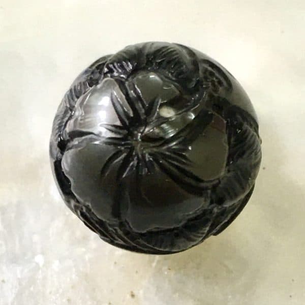 Carved Black pearl with Hibiscus1 flowers and Polynesian tattoo designs