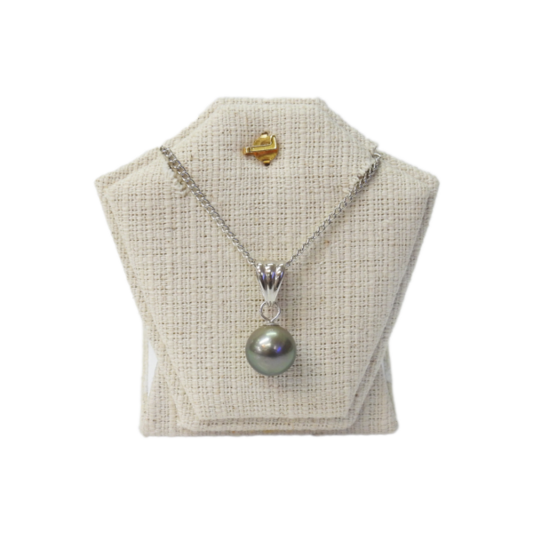 Elegant pearl jewelry set featuring a silver pendant necklace and matching earrings by Island Craft Ltd Since 1942.